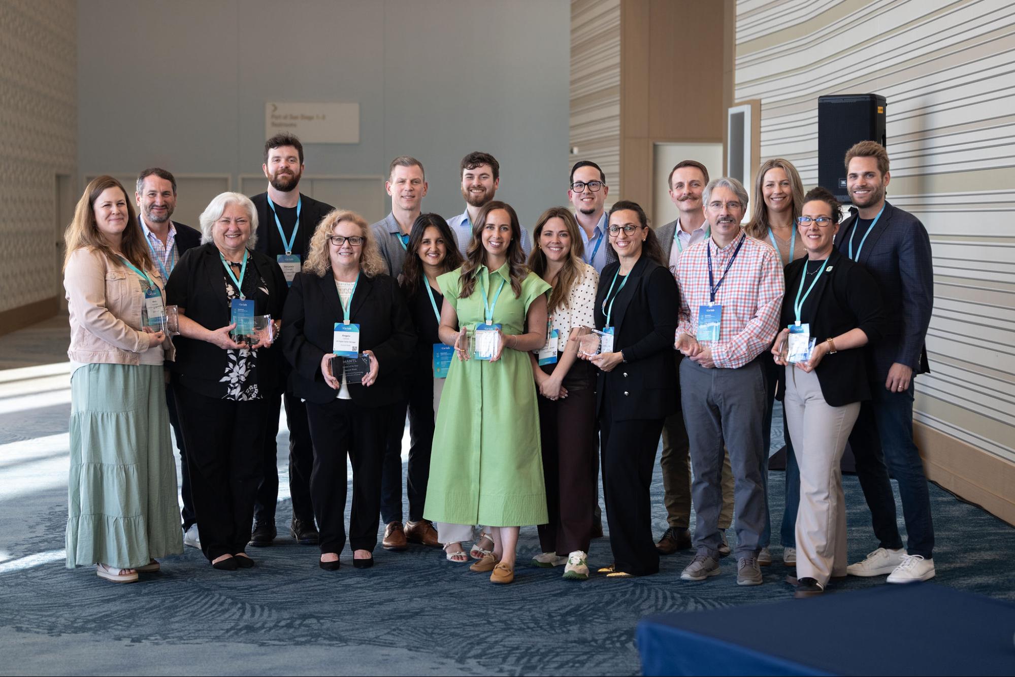 MANTL-award - Alkami Technology A group of bankers with their 2026 “For the MANTL” Awards, standing with Mantle founders.