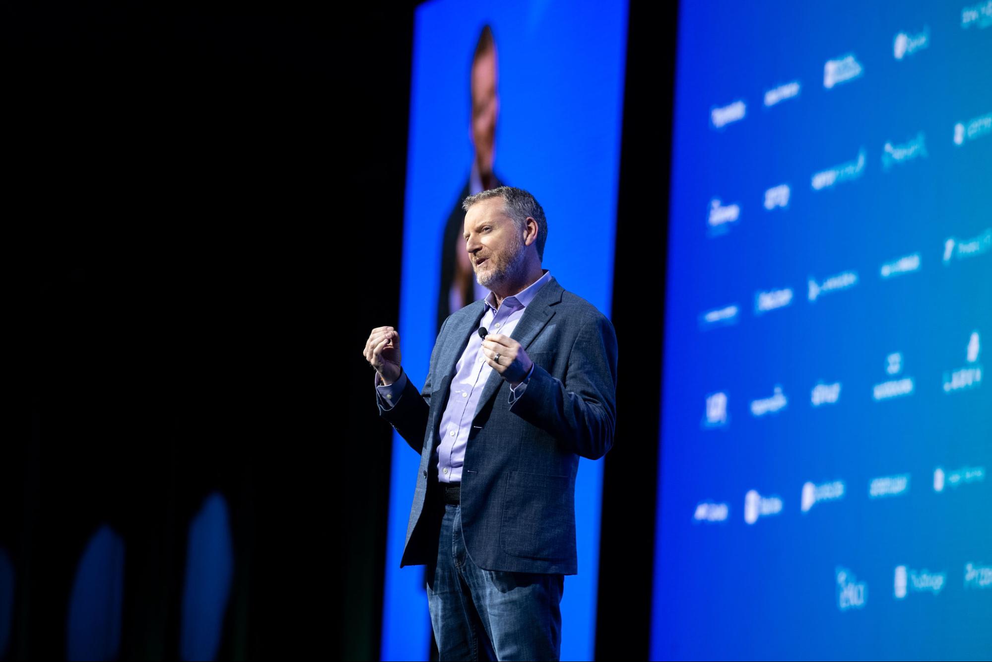 wayne-main-stage-2026 - Alkami Technology Alkami Chief Customer Officer Wayne McCullogh on the Alkami Co:lab mainstage speaking to the audience.
