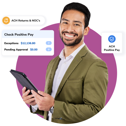 Professional man in a blazer holding a tablet, with fintech dashboard cards showing ACH Positive Pay and checks data in the background.