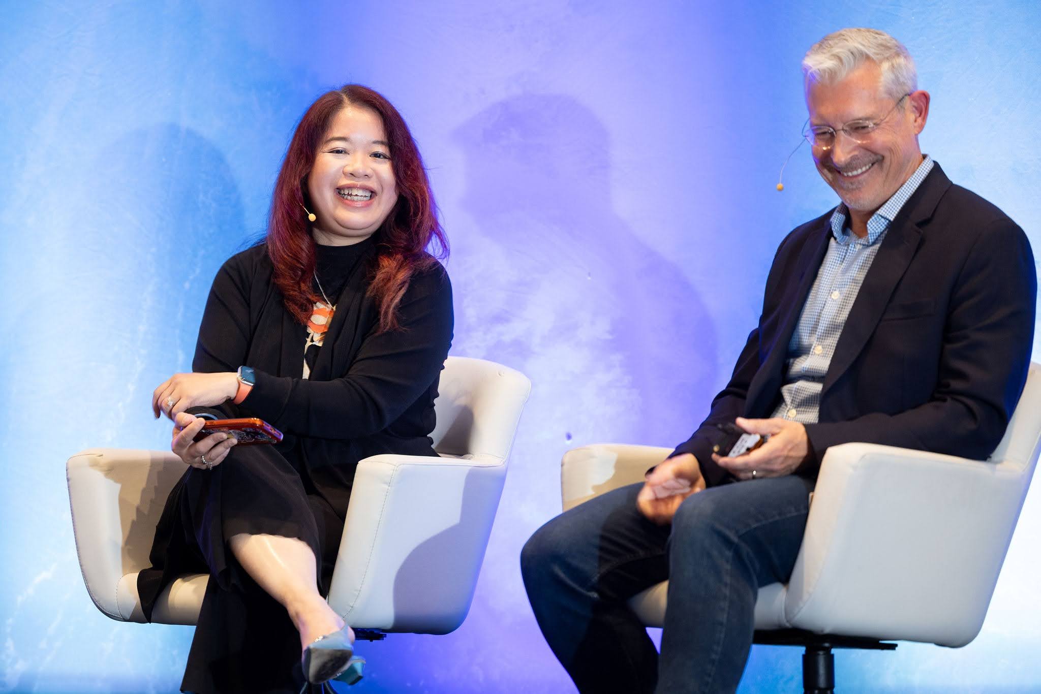 Theodora Lau and Doug Linebarger speaking on stage at Alkami Co:lab 2026