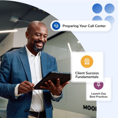 Smiling man in a blue suit uses a tablet during a training session, with floating cards reading 'Preparing Your Call Center', 'Client Success Fundamentals', and 'Launch Day Best Practices'.