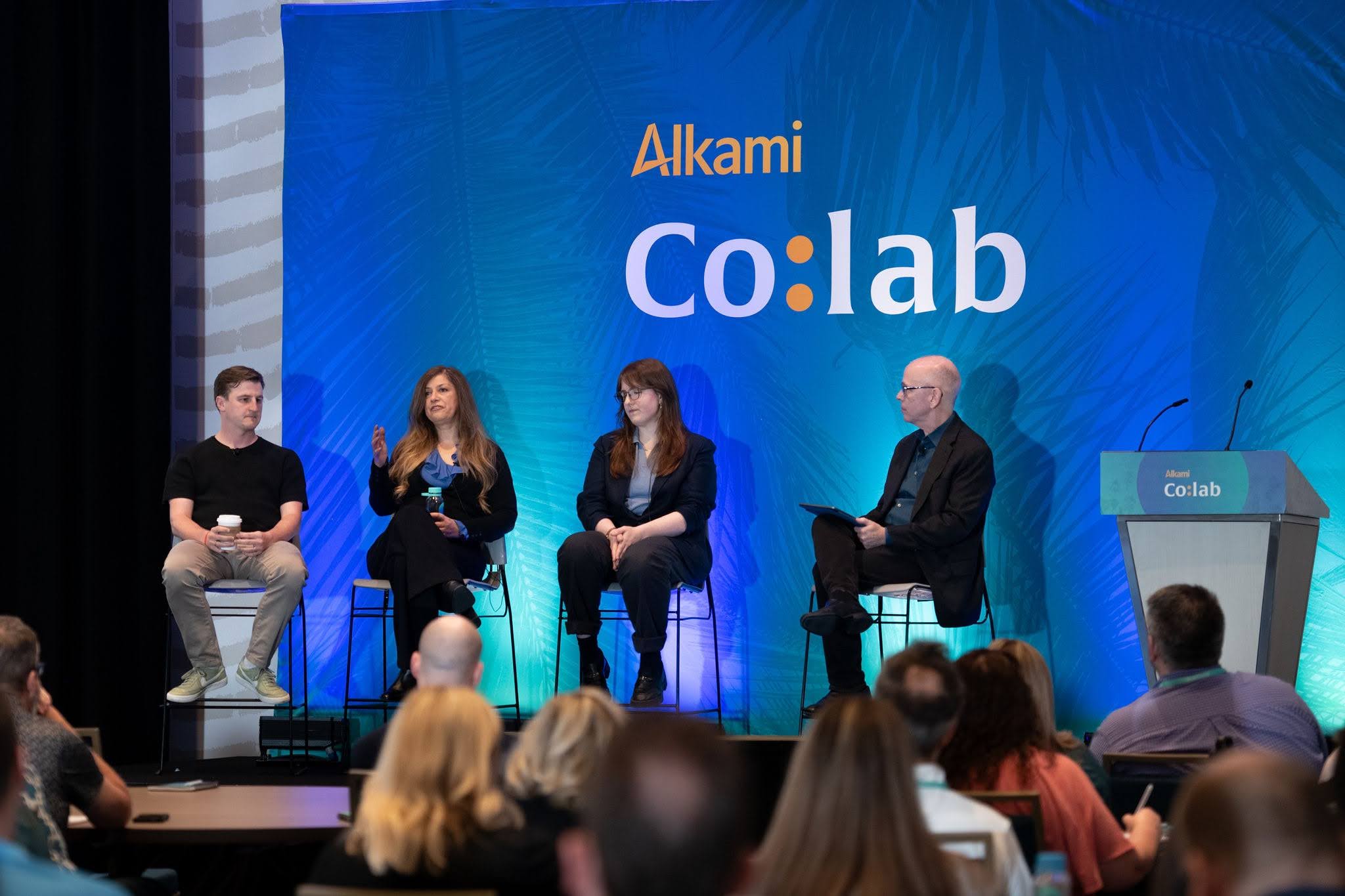 digital-banking-experts_colab-2026 - Alkami Technology A panel of four digital banking experts on stage at the 2026 conference Alkami Co:lab.